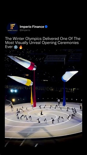𝗪𝗲𝗮𝗹𝘁𝗵 / 𝗙𝗶𝗻𝗮𝗻𝗰𝗲 / 𝗘𝗺𝗽𝗶𝗿𝗲 on Instagram: "This wasn’t an opening ceremony, it was large-scale visual engineering in motion. 🌍✨ At the Winter Olympics, the stadium was transformed into a living system of light, choreography, and suspended architecture, with massive floating installations pouring color from above while performers moved in perfectly synchronized circular patterns below. Every motion was precisely timed. Every color shift was intentional. The scale turned the aren