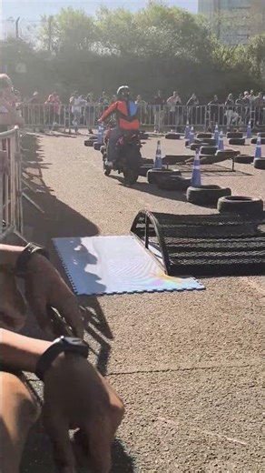 Motorcycle Rider Loses Control on Obstacle Course and Tips over