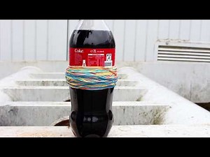 Does a Coca Cola bottle stand by rubber bands? Experiment 🍎