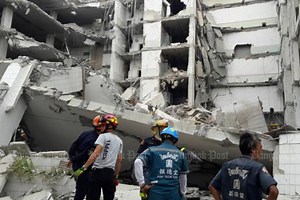 Building being demolished collapses, 2 killed