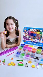 Dive into a world of creativity with the Cra-Z-Loom All-in-One Colossal Loom Studio! ✨ @brisbanefamilyexplorershad had a blast crafting adorable charms like pizza, watermelon, flowers, and pandas. This kit packs a punch with 5600 loom bands, a loom, and beads for endless bracelet, charm, necklace, and keychain possibilities. | Cra-Z-Art | Facebook
