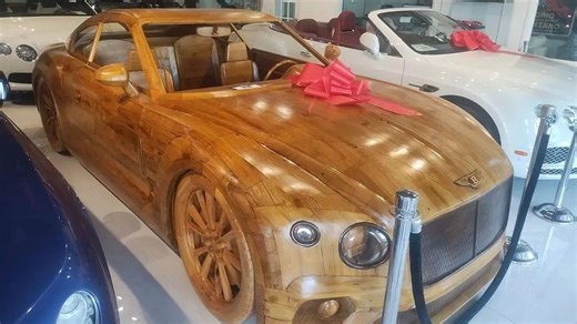 Handcrafted wooden Bentley made in 3,000 hours rolls like a real car