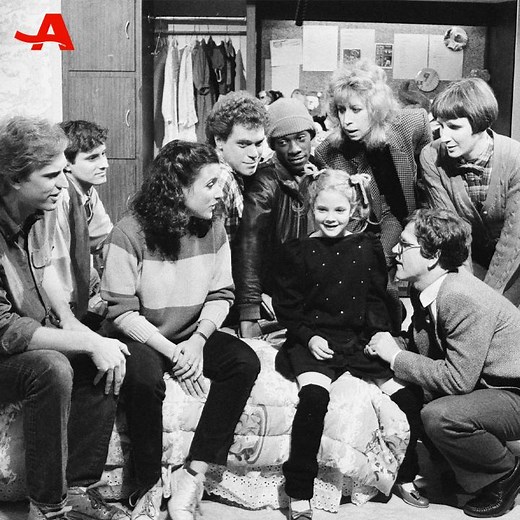 Following the release of her film “E.T. the Extra-Terrestrial,” 7-year-old Drew Barrymore hosted “Saturday Night Live.” This marked the launch of a decades-long connection with “SNL” and its cast members. Drew would return five more times as host and go on to costar in numerous films alongside former “SNL” cast members. | AARP