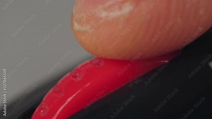 Macro finger scrolls and pushes presses the wheel on computer mouse. Surfing internet and social networks, reading news feed. Desk jockey or office monkey concept. Scrolling