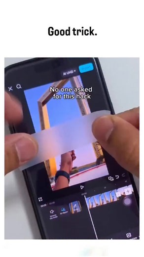 Fact Samjho on Instagram: "The post shares a viral video tutorial demonstrating a low-tech hack for perfectly aligning circular portraits in mobile editing apps like CapCut, using a physical magnifying glass as a precise overlay guide on the screen. This technique, humorously captioned "No one asked for this hack," has garnered over 27,000 likes and 4.7 million views by appealing to creators seeking quick, accurate edits without advanced software tools. Replies highlight simpler digital alternat