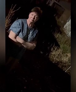 White Lady Locked In Dog Kennel