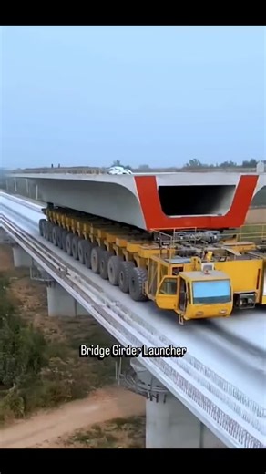 Engineers_adaa01 on Instagram: "A Bridge Girder Launcher is a specialized machine used in bridge construction, particularly for lifting and placing precast box girder bridge segments or precast girders. Here are the key technical details: Key Specifications - Maximum Lifting Capacity: Up to 200 tons - Maximum Span Capacity: Up to 50 meters - Main Girder Length: Up to 60 meters - Support Leg Height: Adjustable from 10 to 20 meters - Lifting Speed: 0.5 meters per minute - Travel Speed: 5 meters pe