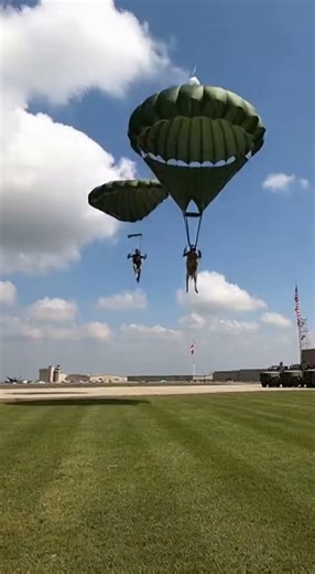 Military K9 Breaks Through Storm Over Open Fields