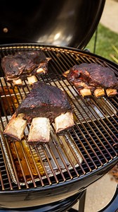 7.5K views · 111 reactions | Dino Ribs: The only cut of meat that can make the 37" Ranch Kettle look like a normal-sized grill. | Weber Grills | Facebook