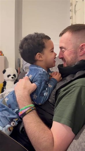 Father and Son's Tender Moment Captured