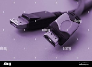 Audio video HDMI computer cable plug and 20-pin male DisplayPort gold plated connector for a flawless connection on a purple background Stock Photo - Alamy