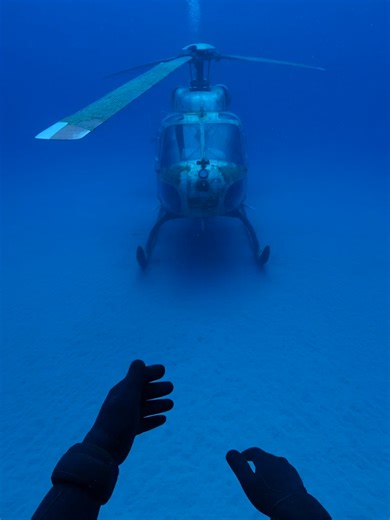 POV: Sunken rescue mission 🚁🌊🤿 Exploring an abandoned helicopter on the ocean floor… bent rotors, algae-covered cockpit, and secrets drifting in the deep blue 👀✨ #3DNailArt #SeasonalNails #UnderwaterExploration #SunkenSecrets #DeepSeaPOV #OceanMystery #LostPlaces #ViralAdventure #ExplorePage #StoryTok