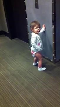 Brookie taking off her diaper