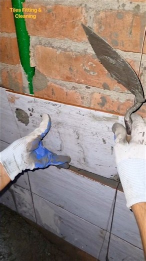 I installed 8x12 ceramic tiles over the water lines on the bathroom wall; how does the work look?