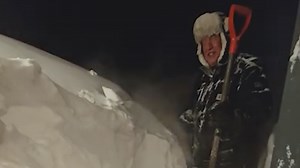 Winter storm piles snow up to rooflines in Michigan