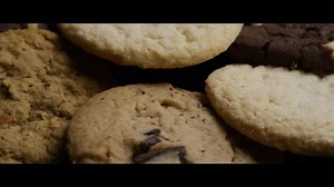 Download Cinematic, Rotating Shot of Cookies on a Plate - COOKIES 101 for free