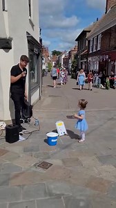 1.6M views · 7.3K reactions | Here from Leeds, UK is an 18 year old brilliant vocalist albert stott singer busker entertaining the shoppers lucky enough to be there. His youngest fan, a lovely little girl joining in the fun! Great talent & fun! youtube.com/channel/UCK6EJj-XE2EU73yZURBAN6g | The Music Man | Facebook