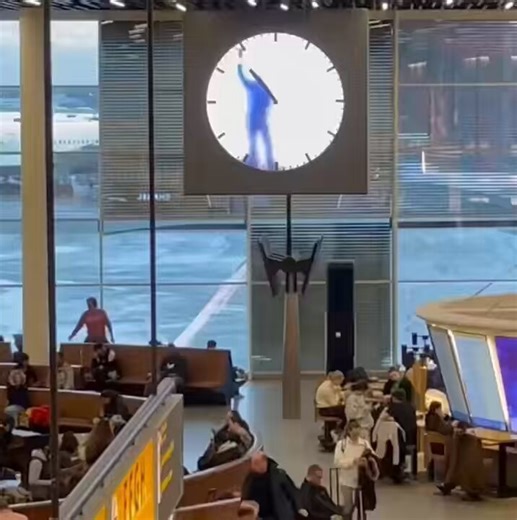 The “Man in the Clock” at Amsterdam’s Schiphol Airport is a 3-metre-tall artwork by Maarten Baas, of a man seemingly painting and erasing the clock hands in real time