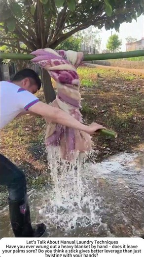 Wringing a Towel Blanket with a Wooden Stick – Old‑School Laundry Hack 🛏️
