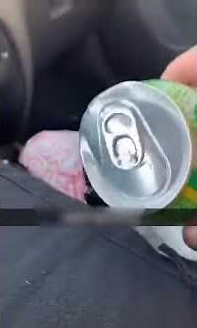 Soda can Sounds Funny and Explodes Inside car in guy's Hand - 1135737