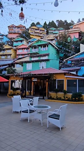 Dive into the spellbinding view of Club Mahindra Mussoorie Resort! Immerse yourself in the allure of vintage cafes and discover hidden pathways that lead to the heart of Uttarakhand's magic. Bond with your family amidst breathtaking views and create a chapter of enchanting memories! Ready to paint your canvas of magical memories? Become a member today! Credits: @buildings_talk_kv #ClubMahindra #ClubMahindraResorts #Mussoorie #Uttarakhand | Club Mahindra