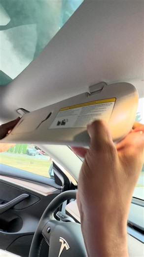 My Tesla sun visor just fell off while driving! #viralshorts