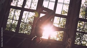 epic slow-motion backflip with long airtime in the sunset