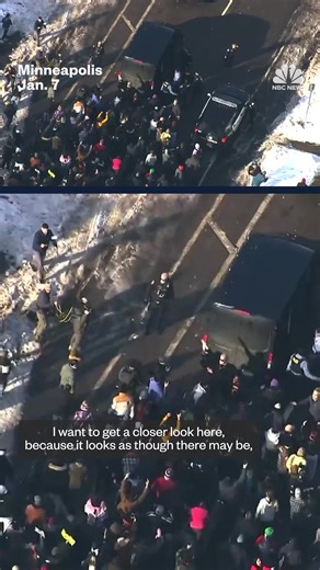 Some Minneapolis protesters throw snowballs at law enforcement officers as demonstrators march after an ICE agent shot and killed a woman. Law enforcement earlier deployed pepper spray and tear gas, KARE reports. | NBC News