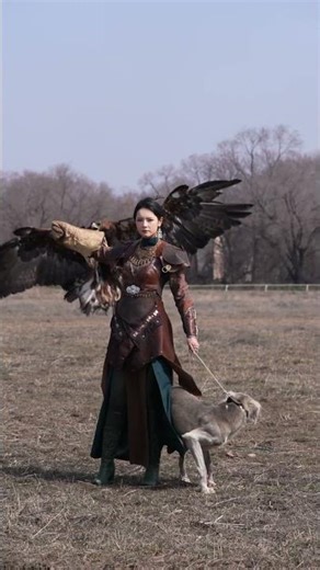 Left hand leads the hound, right holds the falcon—riders sweep the plain in freedom 🦅 #eagles