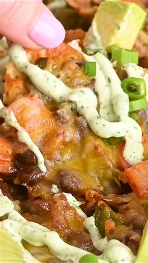 1.7K views · 61 reactions | Perfect for meatless Mondays or Taco Tuesdays! Recipe: https://www.rachelcooks.com/vegetarian-nachos/ | Rachel Cooks | Facebook