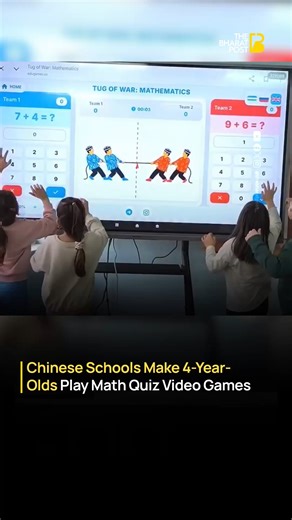The Bharat Post on Instagram: "A video from China has gone viral showing 4-year-old children playing interactive math quiz video games inside a classroom, sparking mixed reactions online. The clip appears to show young kids using large digital screens and fast-paced quiz formats to solve basic arithmetic problems, turning learning into a competitive game at an early age. Supporters say this reflects China’s strong emphasis on early academic training, especially in mathematics and logical reasoni