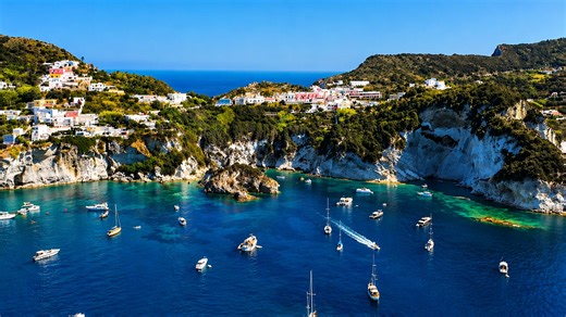 Why do boats gather in this hidden bay?