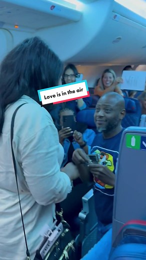 The LAST thing you expect when you come out of an airplane bathroom is this... 😂 #proposal #surpriseproposal #flightattendants #airplane #deltaairlines #goodnews