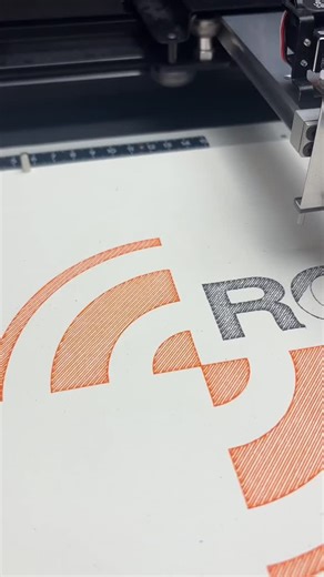 Drawscape on Instagram: "🚁 Robinson Helicopter Co — logo reimagined with precision and texture Plot Time: 9 minutes 45 seconds Plot Distance: 85 feet Pens: Black + Orange fineliner Paper: Hemptone White Logo: Robinson Helicopter Co Dual‑color cross‑hatch fills and crisp lettering bring this aviation mark to life — the orange rotor‑arc pops against the textured black type. Plotted with steady precision to highlight every line, shadow and curve for a tactile, signature look. 🛍️ Shop now @ https: