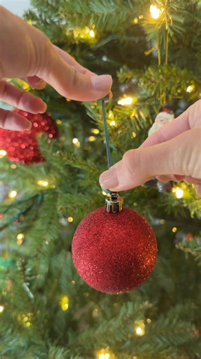 Kara Feheley on Instagram: "✨ Christmas Tree Ornament Hack! 🎄 Use these non-slip hanging hooks to keep your ornaments securely in place. Say goodbye to worries about fragile ornaments falling and crashing to the ground! 🎉 @ornamentanchor FOLLOW @kara.shops.it.all then COMMENT “ANCHOR” for a direct 🔗 to your DMs #amazonfinds #amazonmusthaves #christmashack #amazongadgets #founditonamazon #HolidayHacks #ChristmasDecor #christmasfinds Christmas tree hack, amazon christmas tree hack, non slip orn