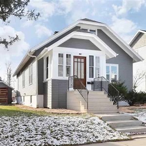 GREAT CHARACTER | A TRUE GEM An enclosed front porch welcomes you to this beautiful 3 bedroom, 2 bath home. Step inside to the open living room with hardwood floors that flow into the dining area. The kitchen comes complete with white cabinetry and a full appliance package. Main floor master bedroom is complete with a private bath and walk-in closet. Another bedroom and full bath completes this level. Upstairs you will find a flex room sitting area and the 3rd bedroom with more hardwood floors. 