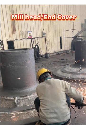 Ball mill feed end cover—shot blasting completed and now undergoing finishing and grinding. Custom cast steel parts made to your drawings #steelcasting #spareparts #millhead #endcover #foundry