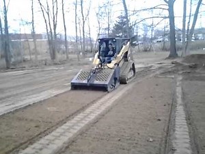 Cat 289C with rockhound