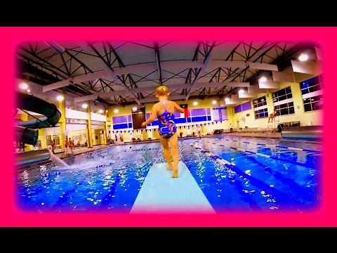 Diving off the diving board and flipping underwater
