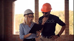Civil Architect Checking Construction.Real Estate Building Project Manager.Two Engineer In Helmet Inspecting Building.Builder Contractor Specialist Read Home Plan Scheme.Developer On Construction Site
