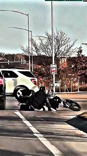 Road Rager Kicks Car Door In Road Rage