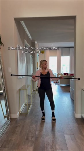 Transform Your Bathroom with This Garland Curtain Rod Hack