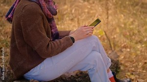 Tablet, backpack and woman traveling in nature in the forest in search of adventure, weekend trip or vacation, digital technology, map in the phone, taking a photo of herself on the phone,MyRealHolida