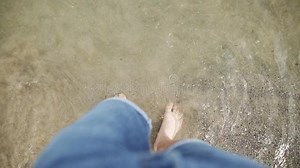 Male Feet on the Beach at Seaside, High Up View. Caucasian Man Standing on the Seashore with Water Covering the Feet in Stock Footage - Video of beach, flip: 100490356
