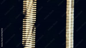 Extreme closeup of guitar strings vibrating after they have been strummed Stock Video