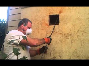 Cleaning a chimney from the ground.