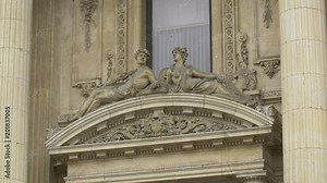 Statues and bas reliefs on a building facade