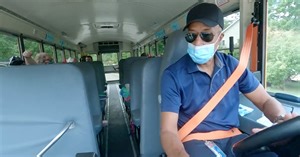 Retired FBI boss helps drive school buses