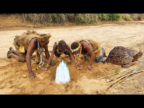 How Hadzabe dig for water in dry rivers | hunter-gatherers lifestyle.