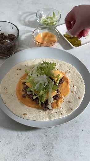 Craving a Big Mac but want something easier and homemade? These Air Fryer Big Mac Wraps deliver all the classic flavors you love—juicy beef, melty cheese, crisp lettuce, and that signature sauce—wrapped up in a warm tortilla. Quick, delicious, and perfect for a fuss-free meal! | Fork To Spoon